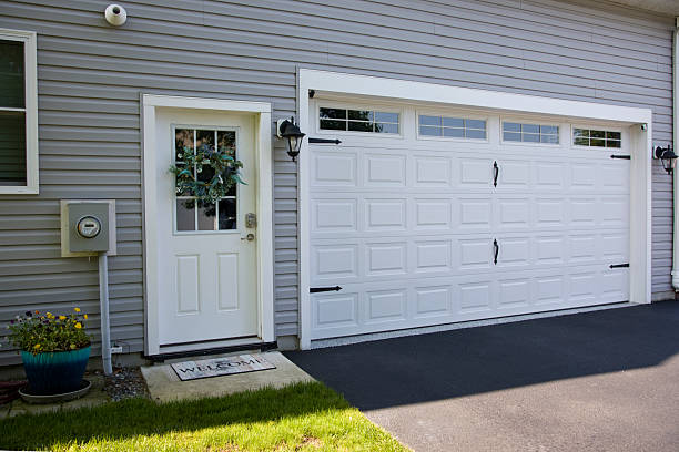 24/7 Emergency Garage Door Panel Replacement experts in Andrews, NC